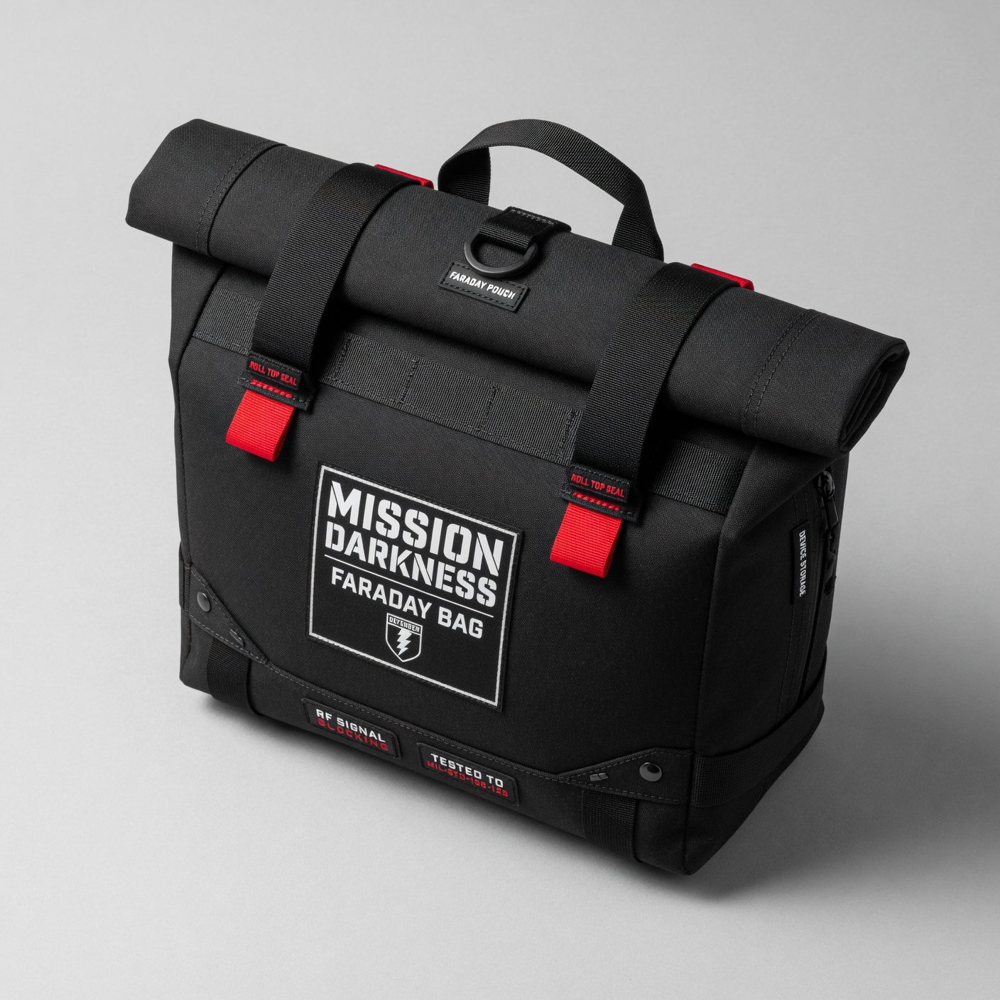 Mission Darkness Faraday bag with double roll-top closure on clean surface